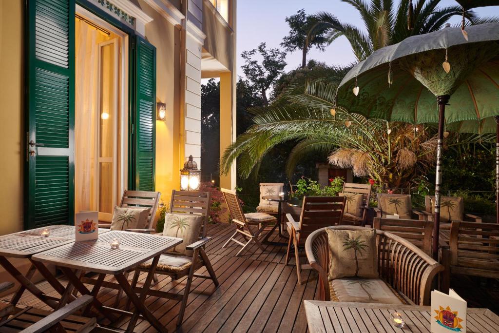 Patio nebo venkovní prostory v ubytování Palm Gallery Hotel