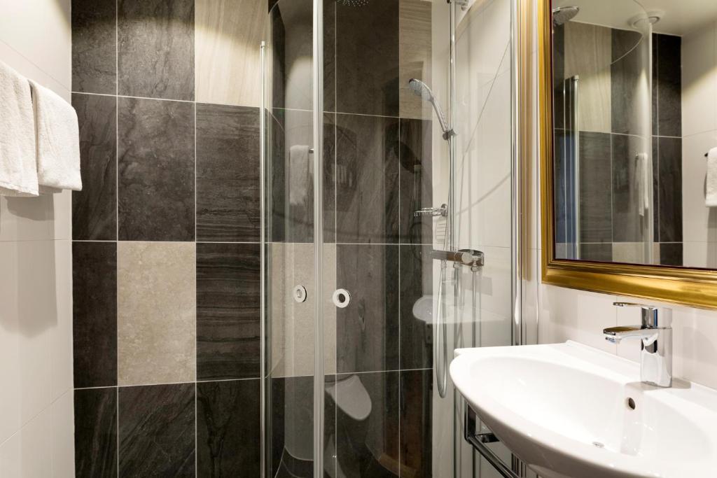 Koupelna v ubytování ProfilHotels Calmar Stadshotell