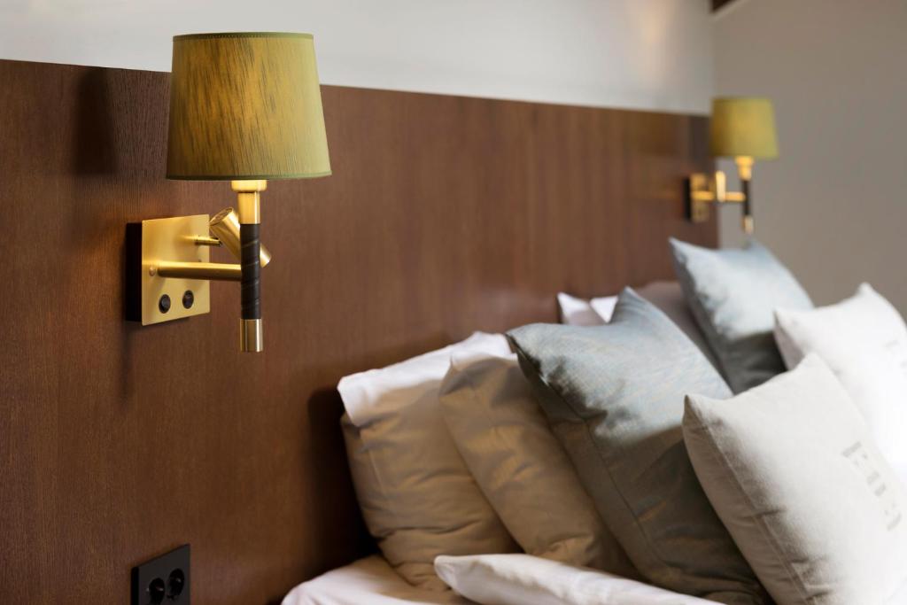 Postel nebo postele na pokoji v ubytování ProfilHotels Calmar Stadshotell
