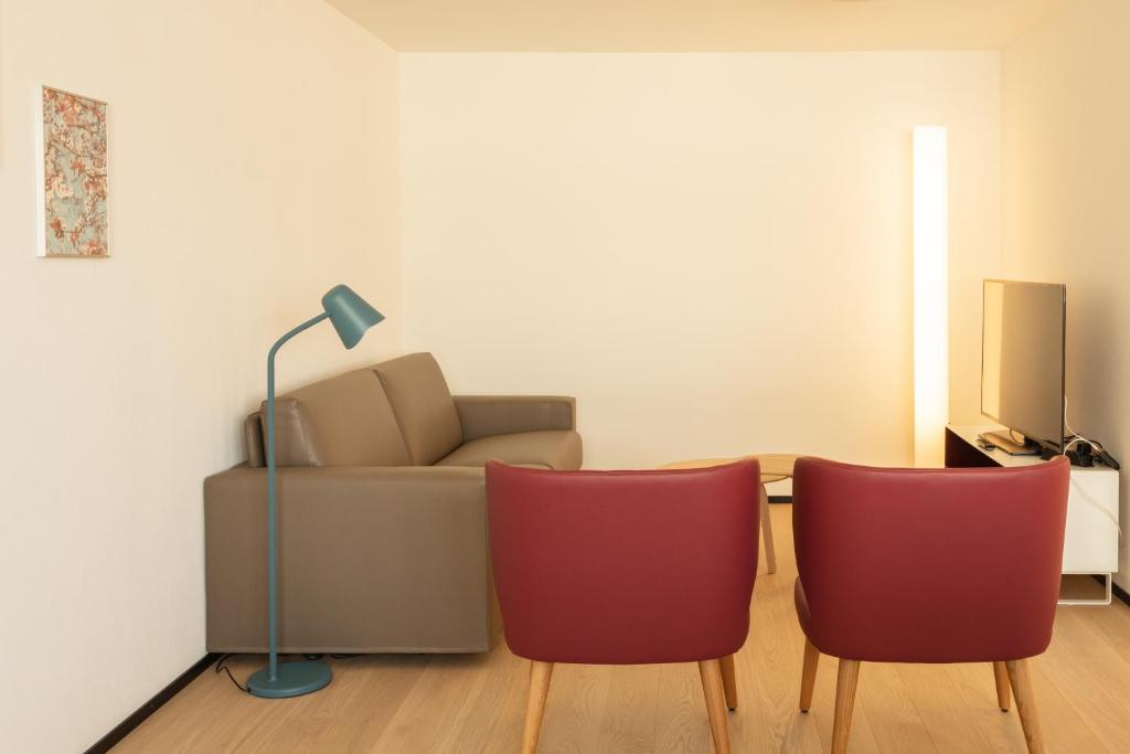 Posezení v ubytování EMA House Serviced Apartments Superior Downtown