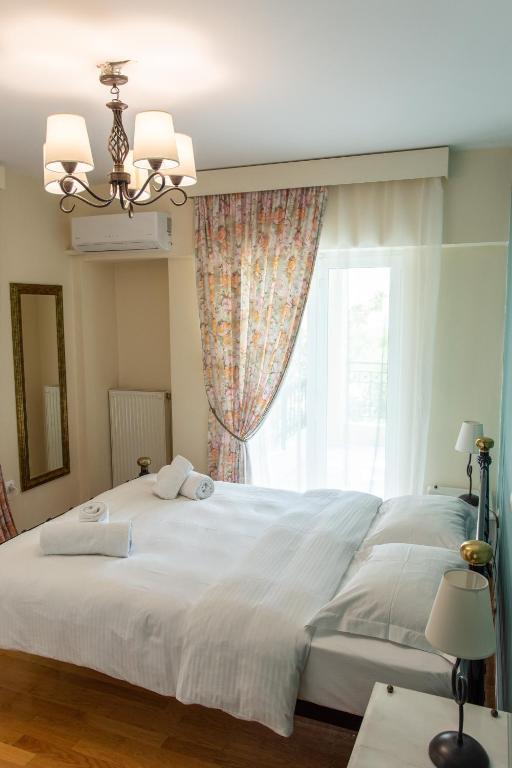 Posteľ alebo postele v izbe v ubytovaní Apartments Nina