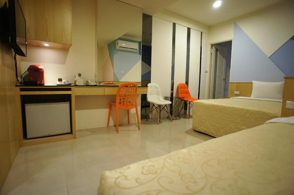 Kuchyň nebo kuchyňský kout v ubytování Xi Xin Guan Hot Spring Resort