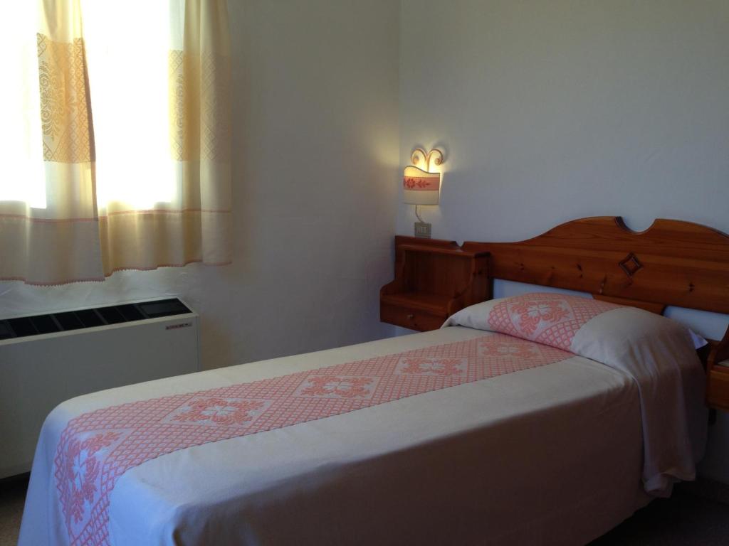 Postel nebo postele na pokoji v ubytování Hotel 3 Botti