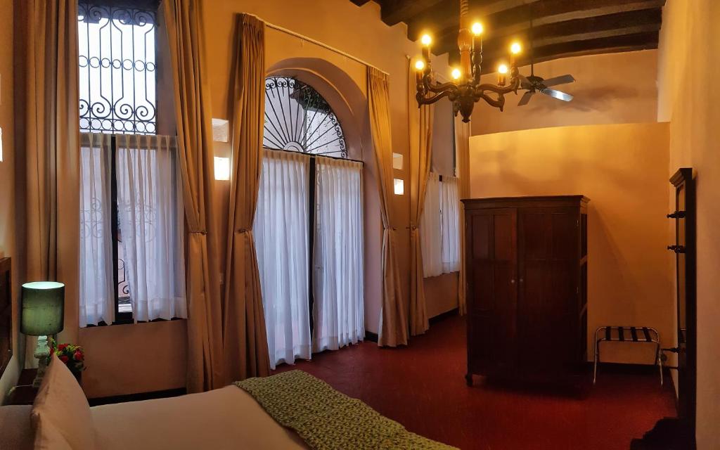 Postel nebo postele na pokoji v ubytování Hotel Boutique Casa Córdoba Estrella