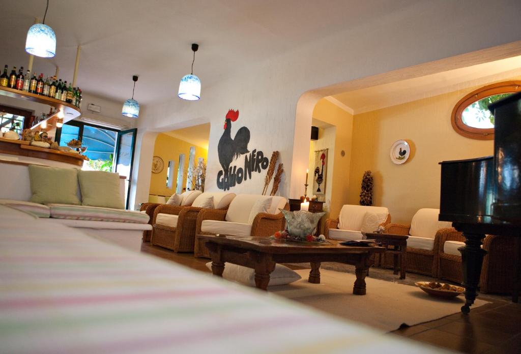 Posezení v ubytování Hotel Gallo Nero