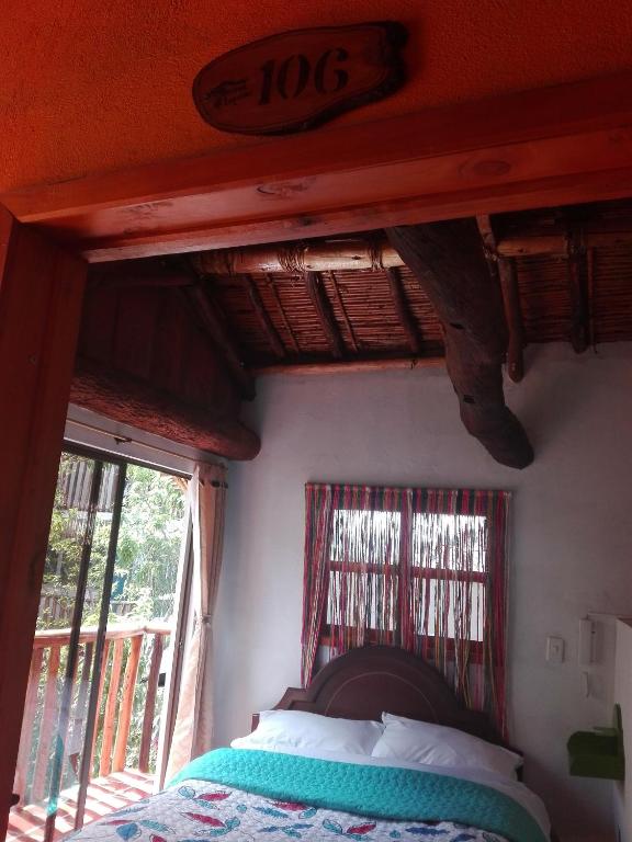 Postel nebo postele na pokoji v ubytování Spa Posada 4 Esquinas