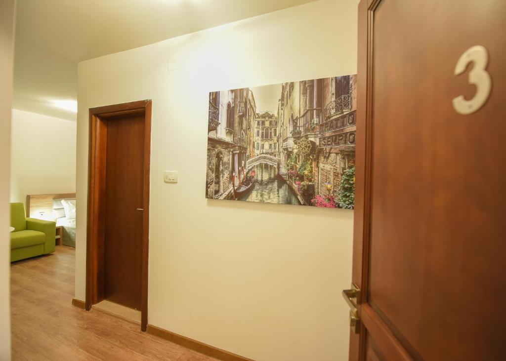Postel nebo postele na pokoji v ubytování Korzo apartmani