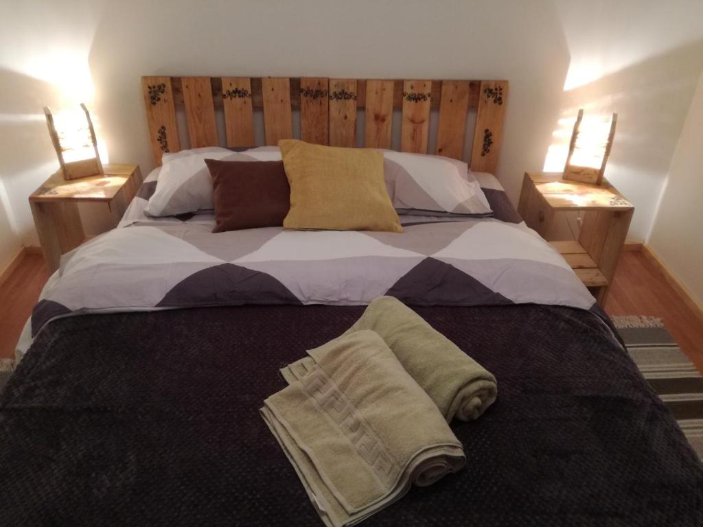 Postelja oz. postelje v sobi nastanitve Hostal Mi Paz