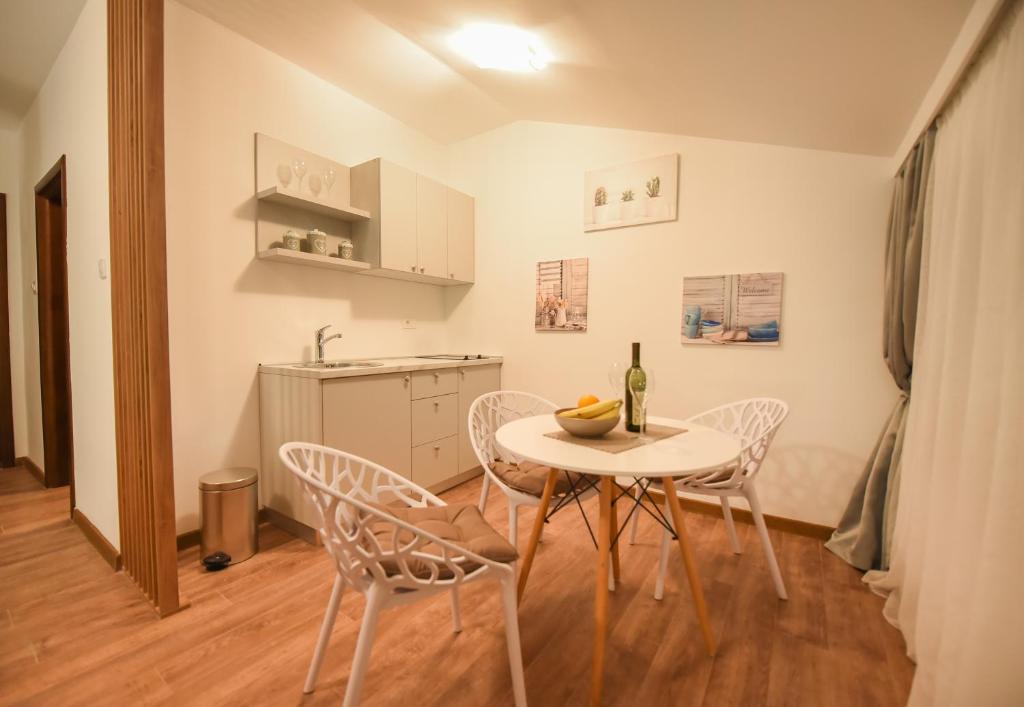 Kuchyň nebo kuchyňský kout v ubytování Korzo apartmani
