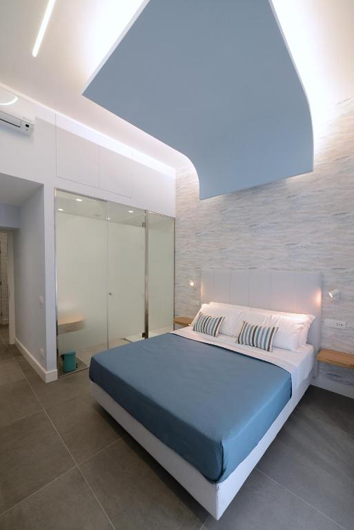 Posteľ alebo postele v izbe v ubytovaní In Centro B&B