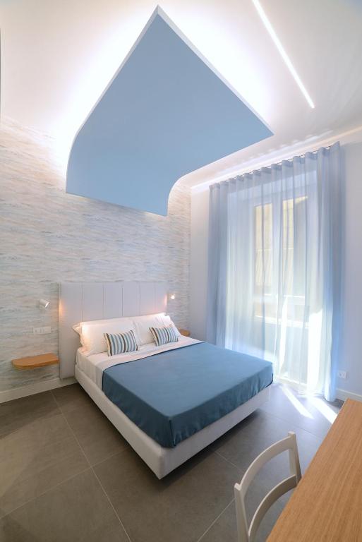 Posteľ alebo postele v izbe v ubytovaní In Centro B&B