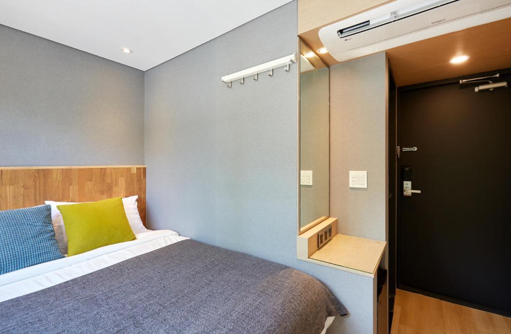 Cama ou camas em um quarto em Hostel CLEO Seoul Hongdae
