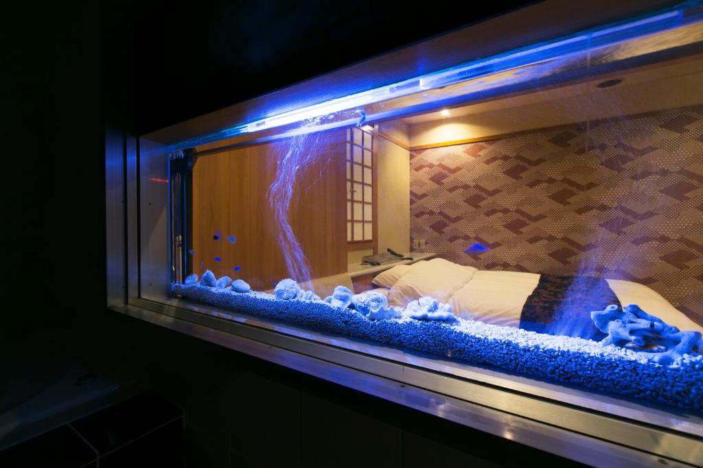 Postel nebo postele na pokoji v ubytování Hotel Atlantis Higashi Osaka (Adult Only)