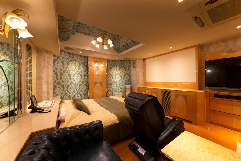 TV a/nebo společenská místnost v ubytování Hotel Luna Ikeda (Adult Only)