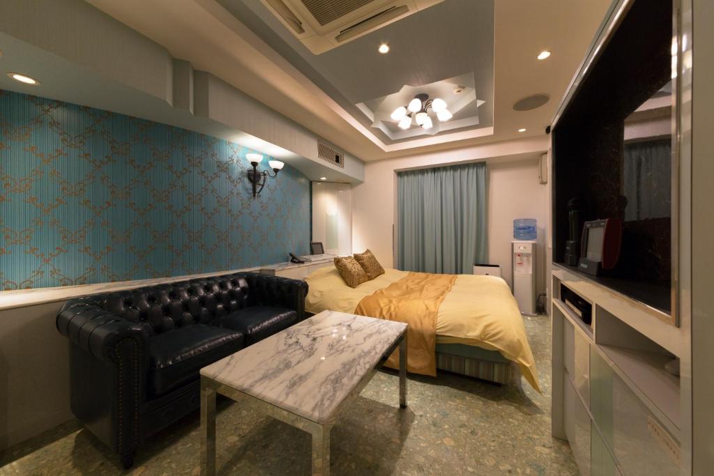 TV a/nebo společenská místnost v ubytování Hotel Luna Ikeda (Adult Only)