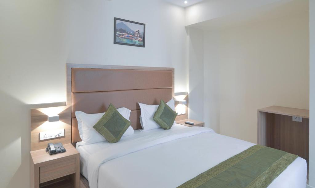 Postel nebo postele na pokoji v ubytování Hotel West Blue