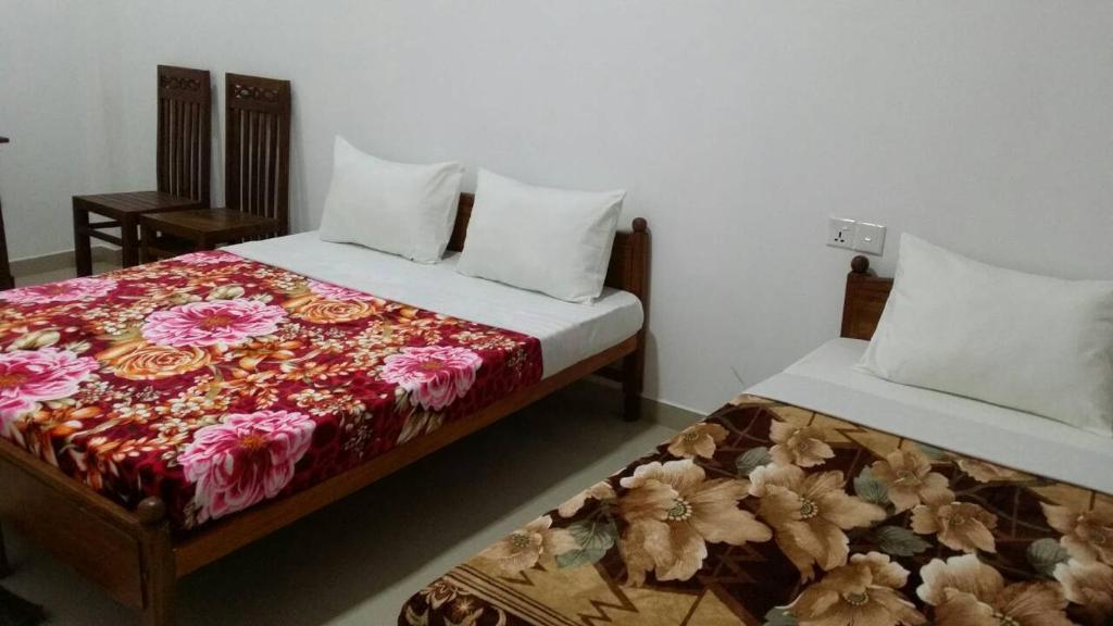 Postel nebo postele na pokoji v ubytování Tea Breeze Motel