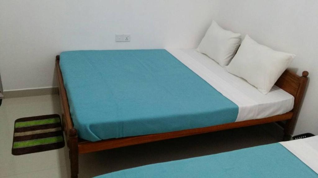 Postel nebo postele na pokoji v ubytování Tea Breeze Motel