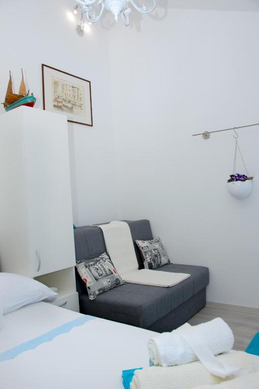 Posedenie v ubytovaní Apartmani Gloria
