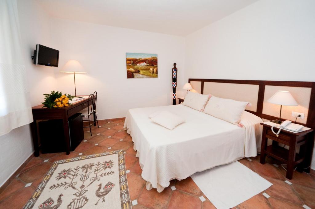 Кровать или кровати в номере S'Arenada Hotel - Adults Only