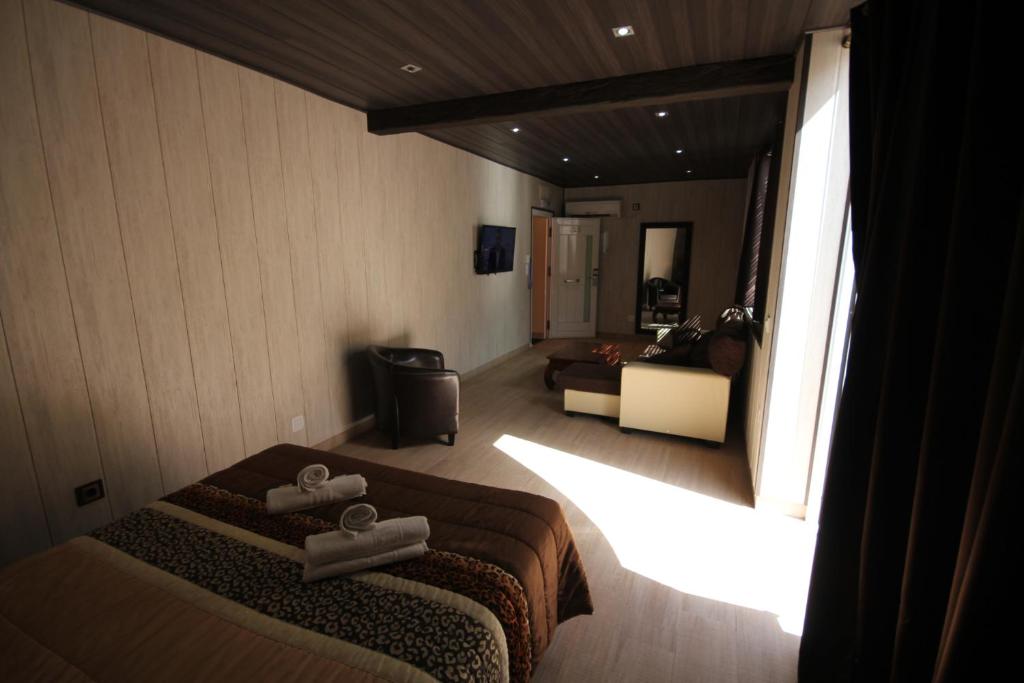 Posteľ alebo postele v izbe v ubytovaní Hotel Copacabana Tarifa Beach