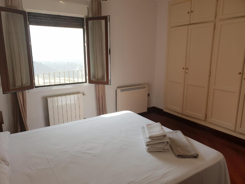 Postel nebo postele na pokoji v ubytování Apartamento Mirador del Tajo