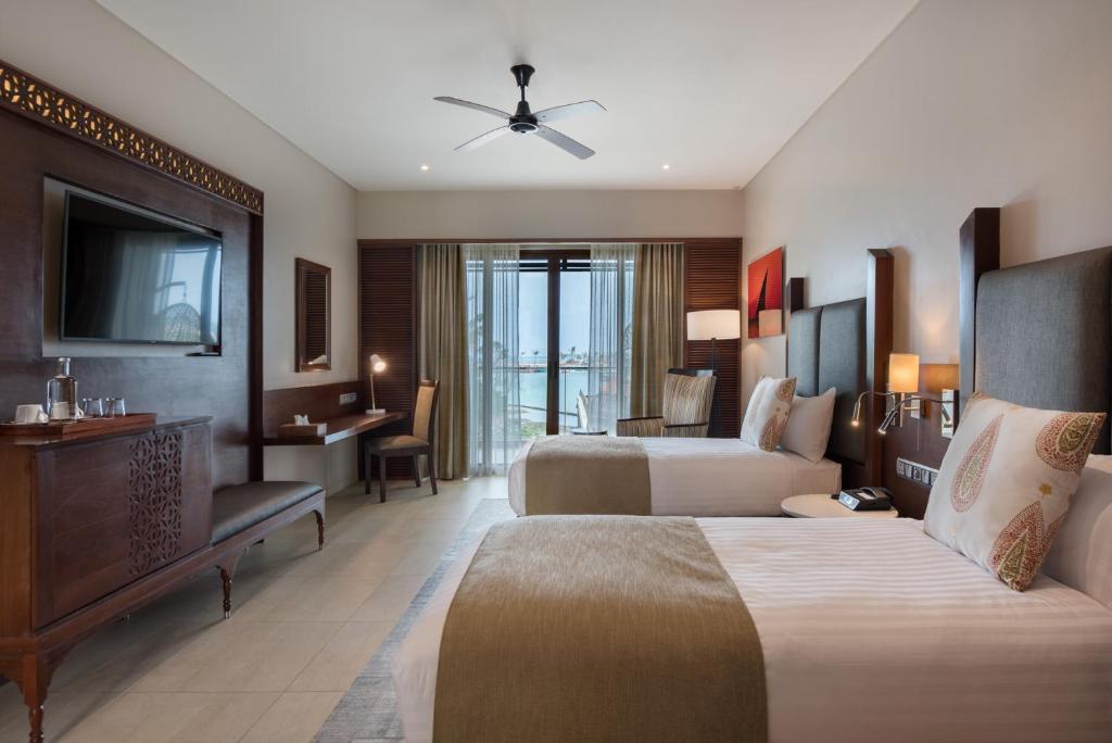 Кровать или кровати в номере Hotel Verde Zanzibar - Azam Luxury Resort and Spa - Dry Hotel