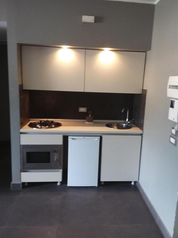 A kitchen or kitchenette at Uniclub House