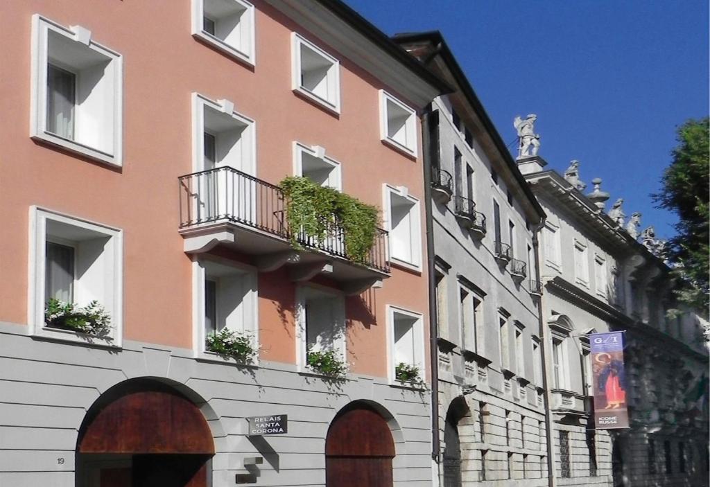 
a large building with a large window at Relais Santa Corona in Vicenza

