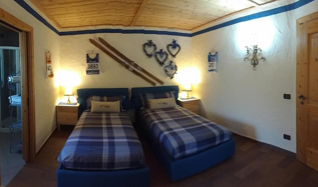 Postel nebo postele na pokoji v ubytování Maso valfloriana