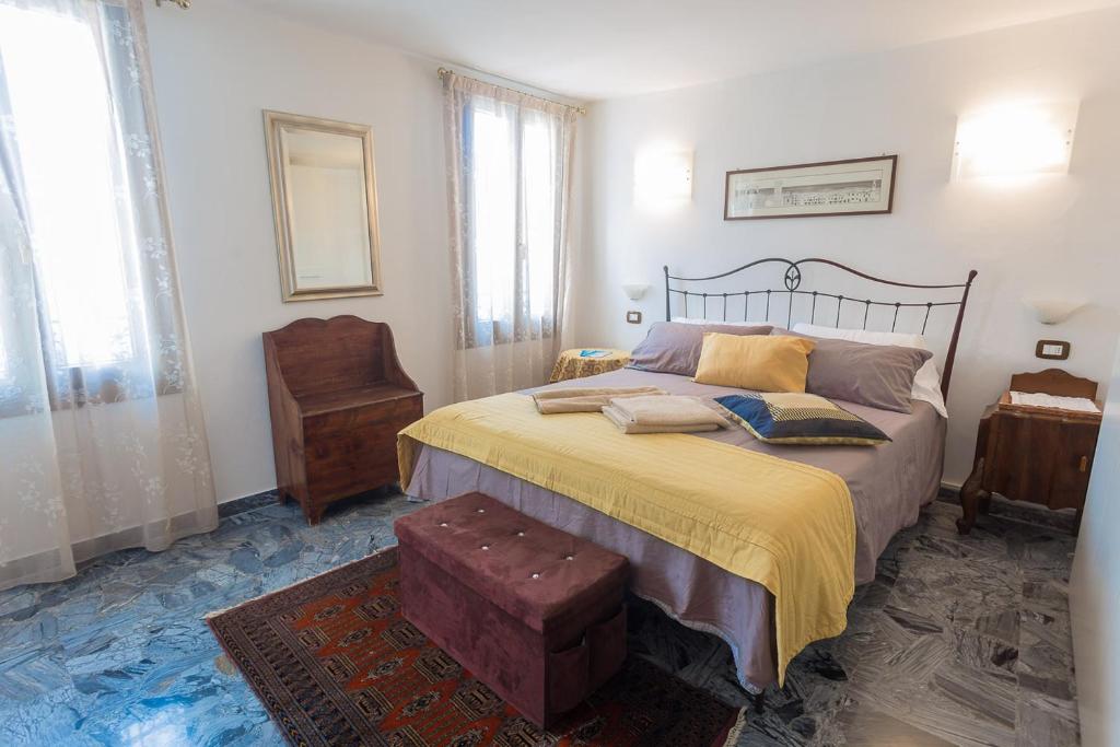 Posteľ alebo postele v izbe v ubytovaní B&B Antico Orologio