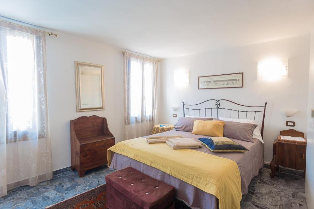 Posteľ alebo postele v izbe v ubytovaní B&B Antico Orologio