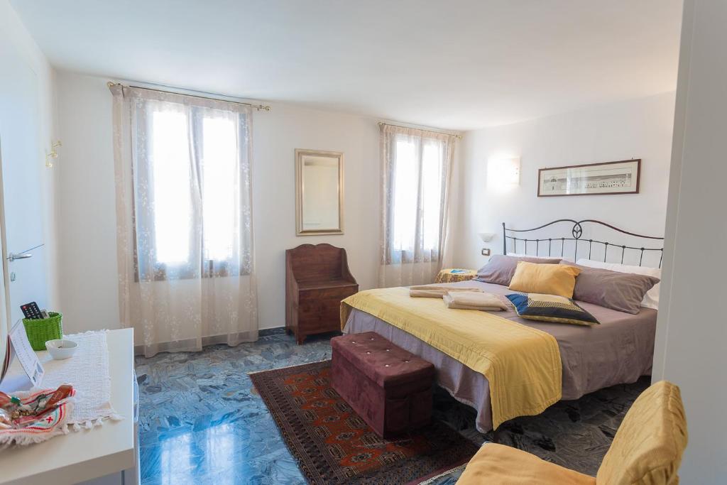 Posteľ alebo postele v izbe v ubytovaní B&B Antico Orologio