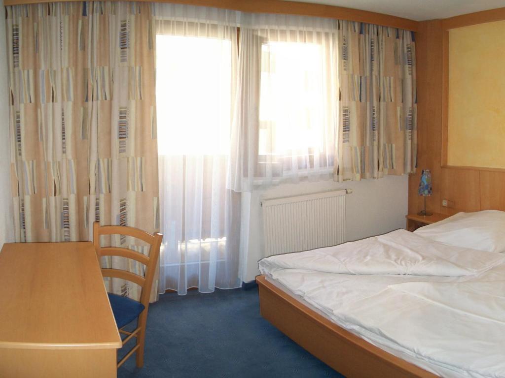 Postel nebo postele na pokoji v ubytování Appartements Hirner