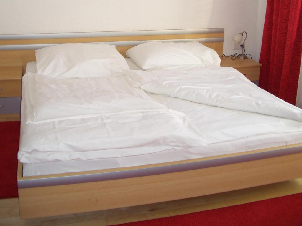Postel nebo postele na pokoji v ubytování Appartements Hirner