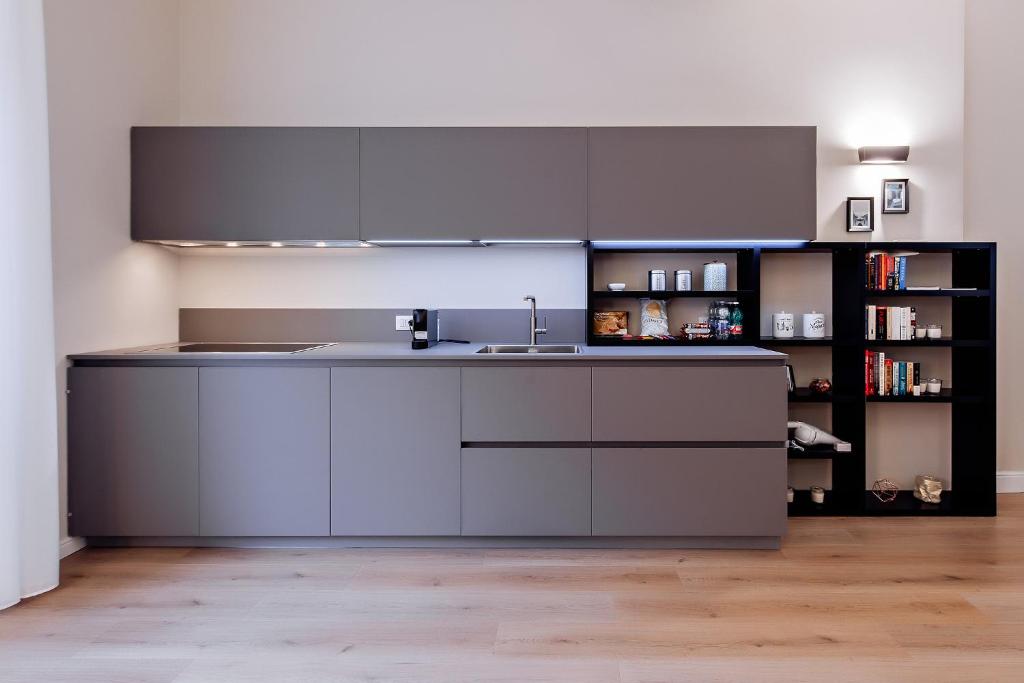 Kuchyňa alebo kuchynka v ubytovaní Milano Manzoni CLC Apartments