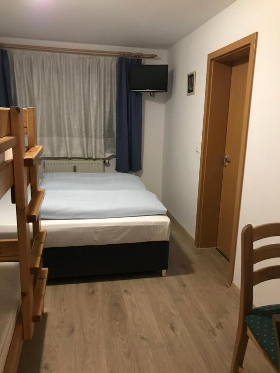 Hotel Guntia Boardinghouse virtueller check in und Zimmer Zugang - Family Room