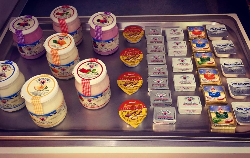 a display case in a refrigerator filled with lots of food at Sorrento Flats in Sorrento