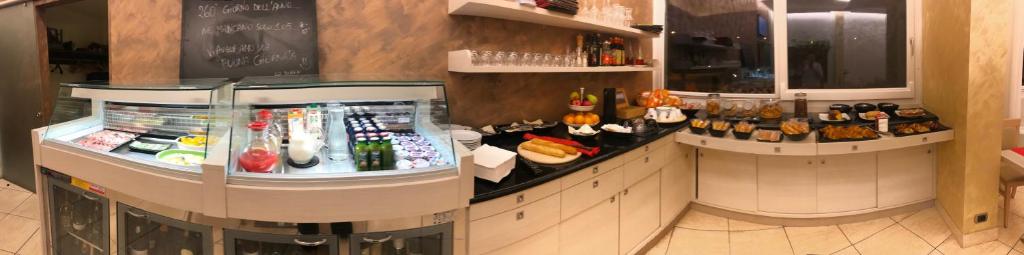 Nápoje v ubytovaní Hotel Nuova Orchidea