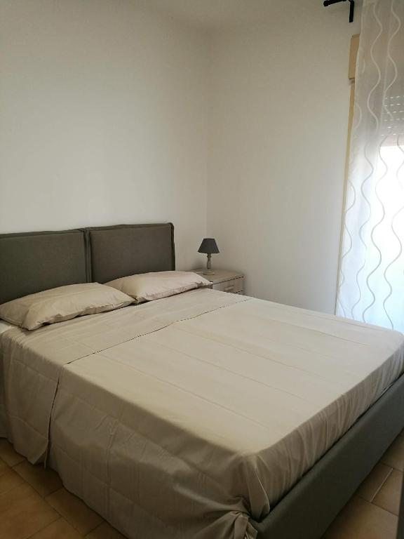 A bed or beds in a room at dreams on the sea
