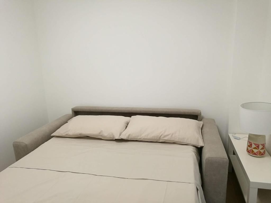 A bed or beds in a room at dreams on the sea