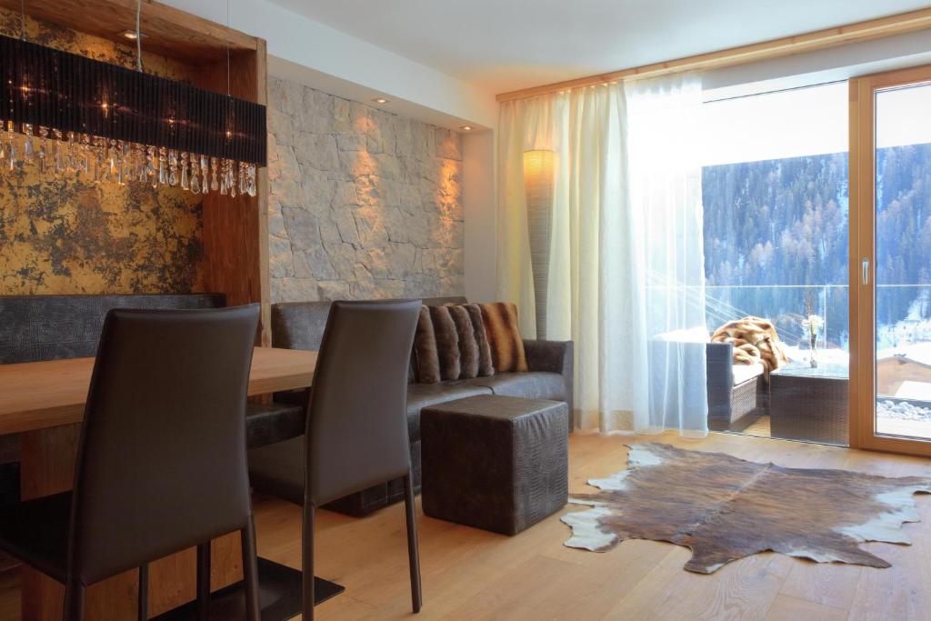 Posezení v ubytování Alpinlodge & Spa