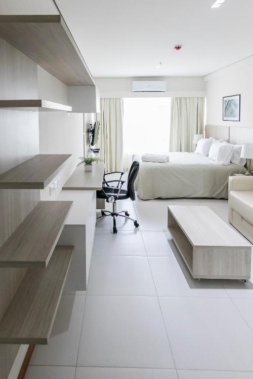 Postel nebo postele na pokoji v ubytování Asuncion Rent Suites Centro