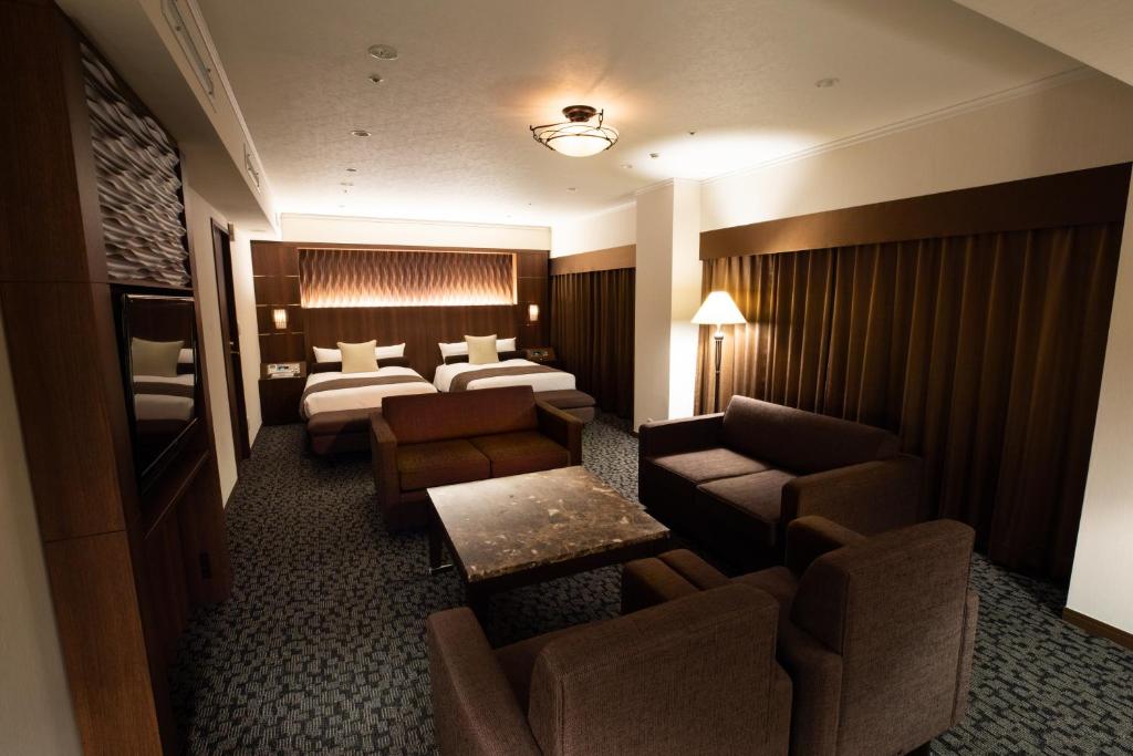 Postel nebo postele na pokoji v ubytování Hotel Bellclassic Tokyo