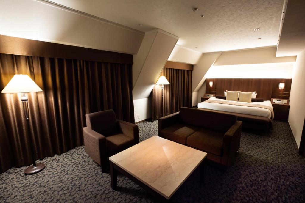Postel nebo postele na pokoji v ubytování Hotel Bellclassic Tokyo
