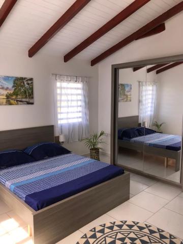 Postel nebo postele na pokoji v ubytování Tigili l'Appart Lagon