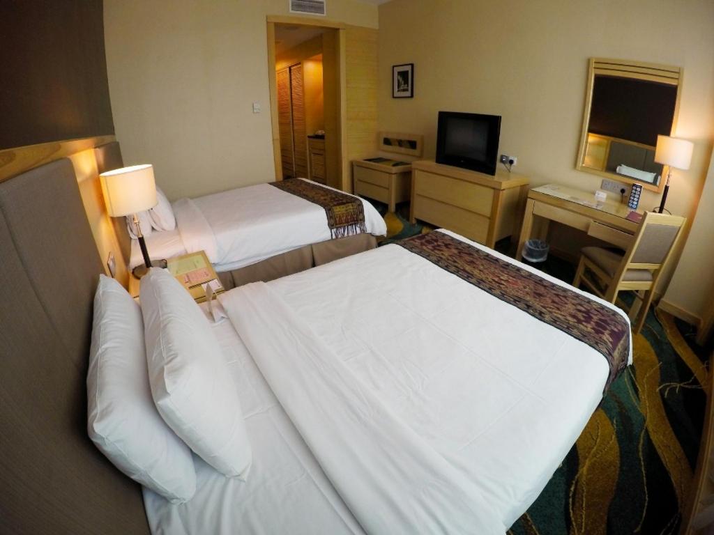 TV a/nebo společenská místnost v ubytování Imperial Palace Hotel