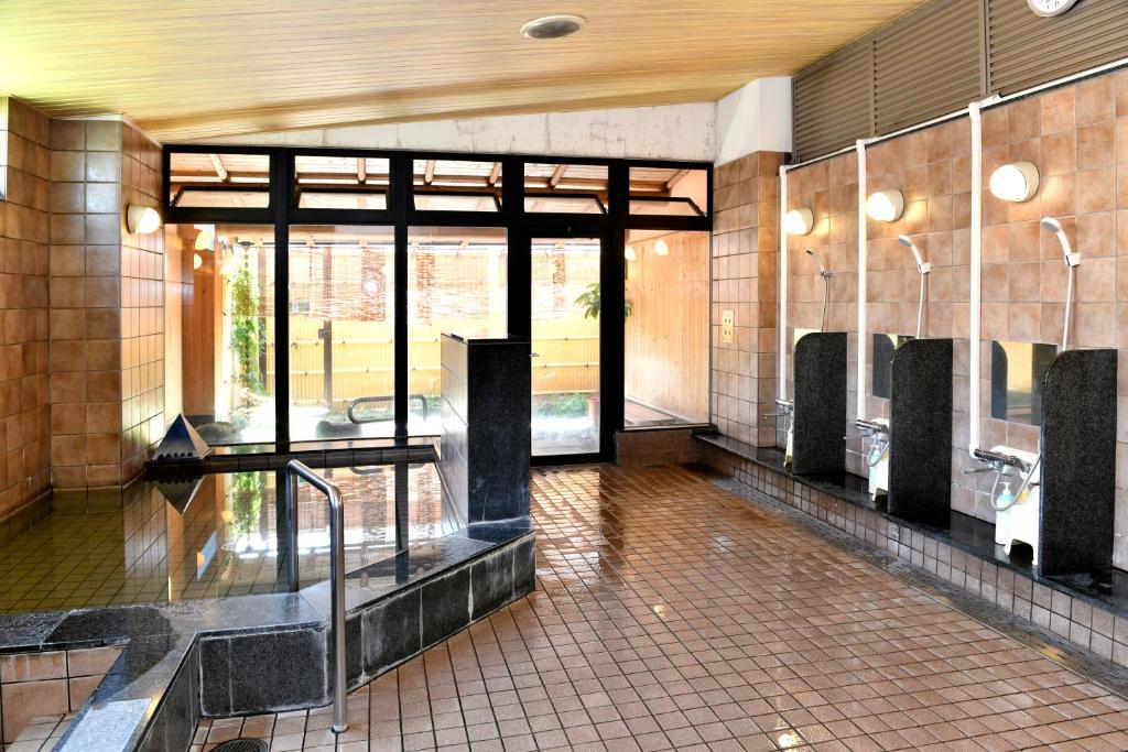 TV a/nebo společenská místnost v ubytování New Commander Hotel Osaka Neyagawa