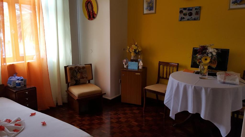 TV a/nebo společenská místnost v ubytování Chez Loutcha Residencial