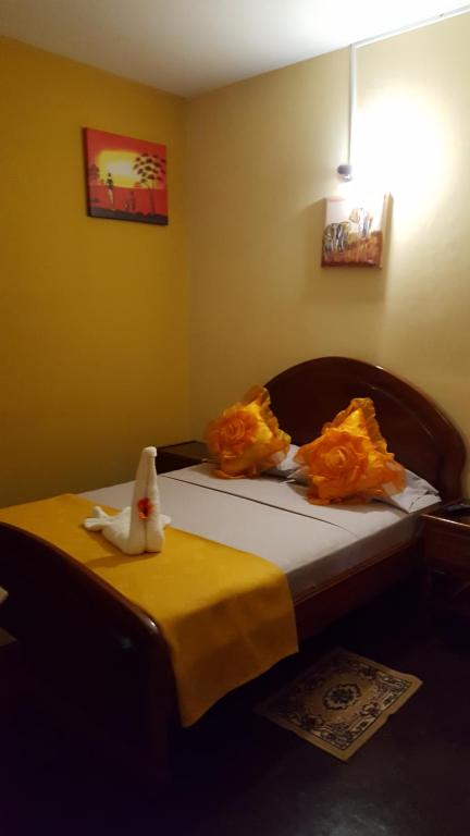 Postel nebo postele na pokoji v ubytování Chez Loutcha Residencial